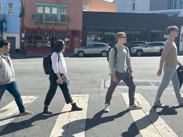 Downtown Mountain View treasure hunt team building - groups solving clues on Castro Street